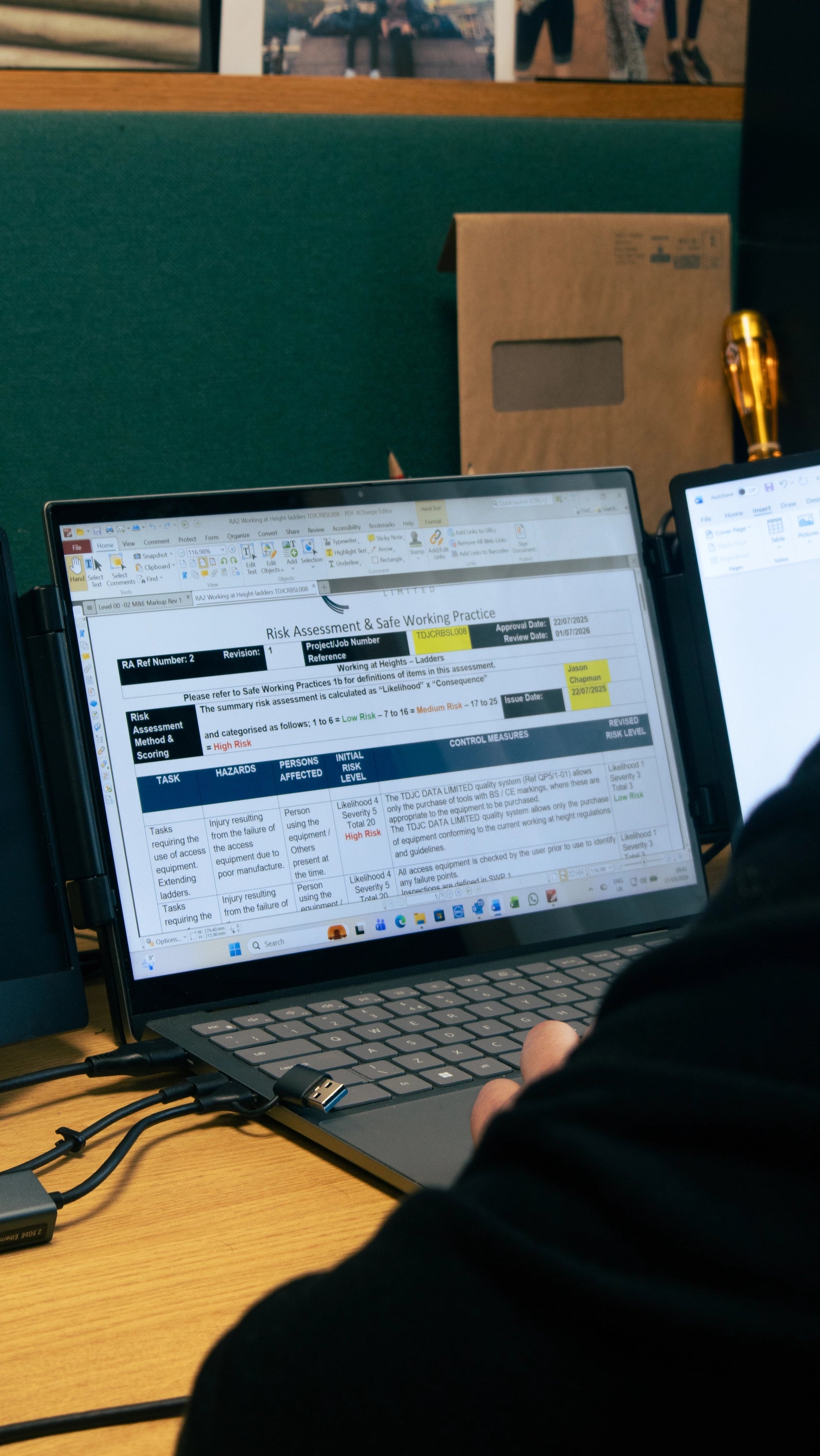 person working at laptop